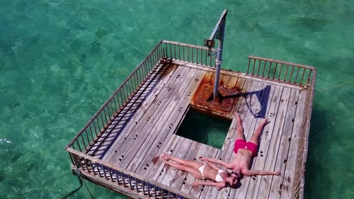 Guy and girl in love on luxury sea view beach lifestyle by transparent ocean and white sand backgrou