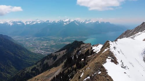 Aerial Drone View on Snowy Peaks of Swiss Alps. Switzerland. Rochers-de-Naye Mountain Peak