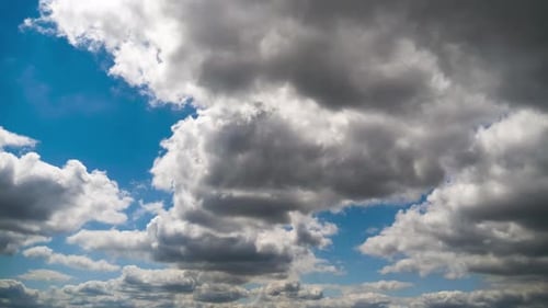 Clouds Moving Across Blue Sky Time Lapse