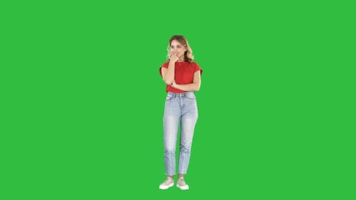 Woman Stands Pondering on Green Screen Background