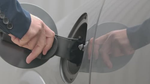 Plugging Electric Car Charging Cable Close Up
