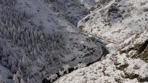 Snowy Mountain Pass Aerial View in Winter