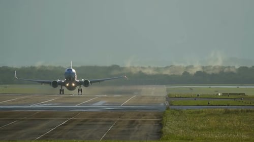 Airplane Taking Off On a Wet Runway