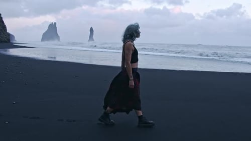 Blue Haired Girl On Black Sand Beach