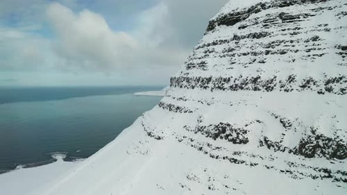 Kirkjufell Mountain at Winter Sunrise, Iceland. Aerial View.