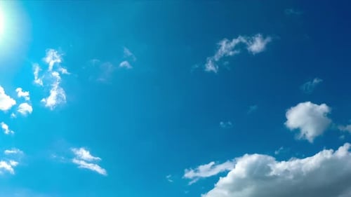 Clouds Drifting Across a Brilliant Blue Sky
