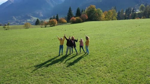 Happy People Waving Hands