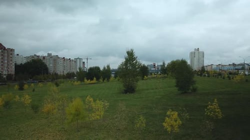 Autumn in the city park. Yellowed leaves are visible on the trees. Aerial photography.