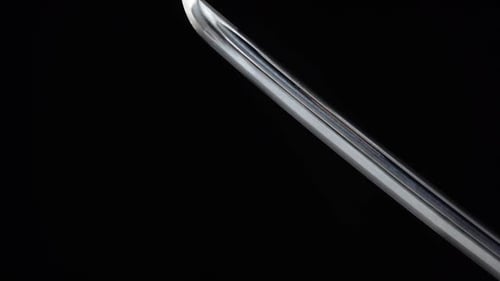 Close Up of Shiny Katana Blade on Black