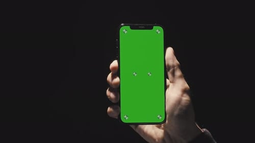 Smartphone with Chromakey Screen on Black Background