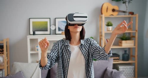 Woman Exploring Virtual Reality in her Home