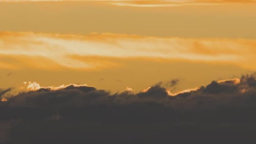 Dramatic Clouds Glowing at Sunrise or Sunset