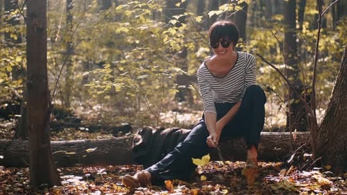 Happy Young Woman in Sunglasses and Jacket Enjoy Autumn