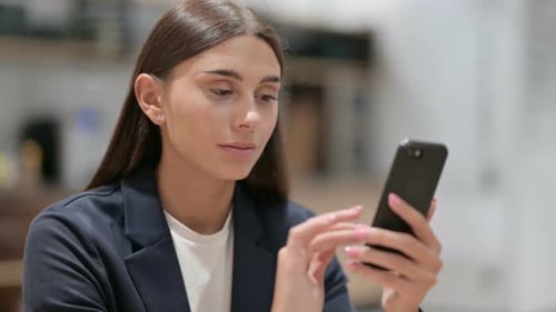 Close Up of Businesswoman Using Smartphone