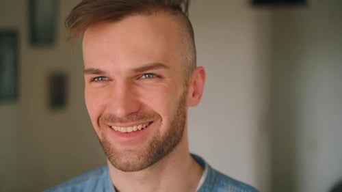 Young European Man is Posing for Camera During Selfisolation at Modern Apartment Spbas