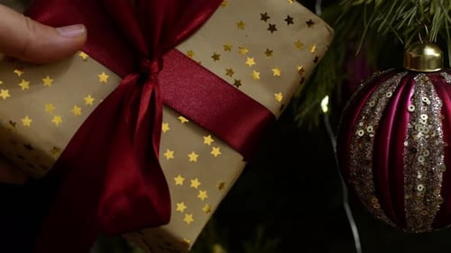 Gift Placement Near Christmas Tree Ornaments