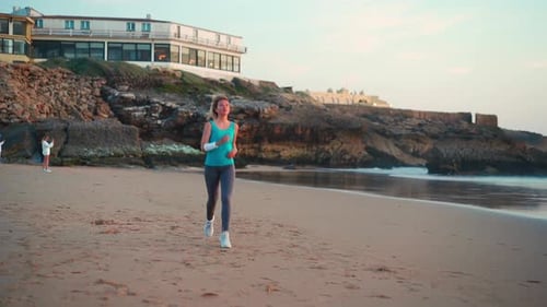 Sporty Blonde Woman Running Ocean Beach