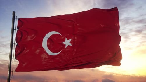 Realistic Turkish Flag Waving Against a Dramatic Sunset Sky
