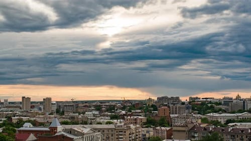 Sunset Time Lapse of the Sun Over Buildings of Kharkov City