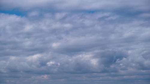 Cumulus Clouds Move in the Blue Sky Cloudscape Timelapse