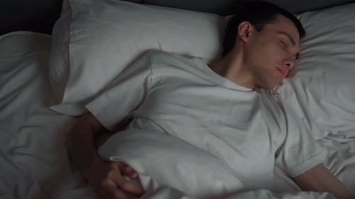 Calm Handsome Man Goes To Sleep Comfortable Cozy Fresh Bed Enjoying Healthy Good Sleep Nap