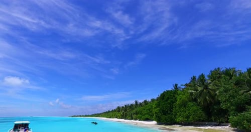 Beautiful above travel shot of a white sandy paradise beach and aqua turquoise water background