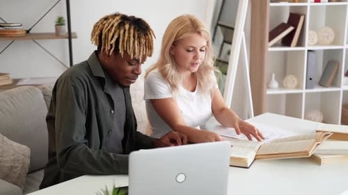 Young Adults Study Together at Home Indoors