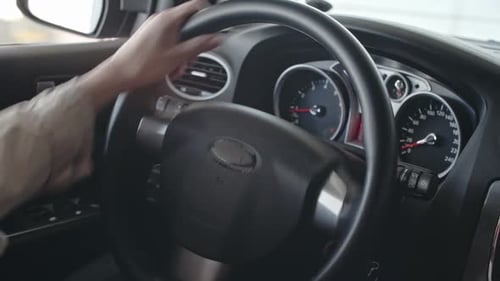 Female Hands of Steering Wheel