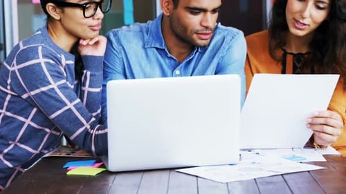 Diverse Team Working Together in Modern Office