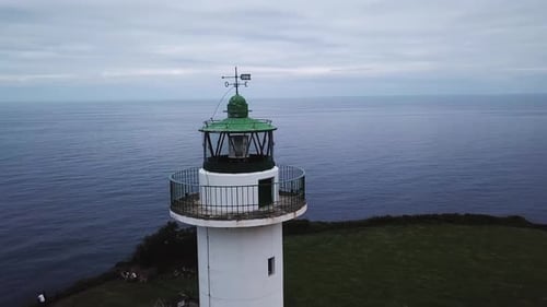 Aerial View of the Lighthouse and Cape Lastres. Bay of Biscay in Northern Spain in Summer