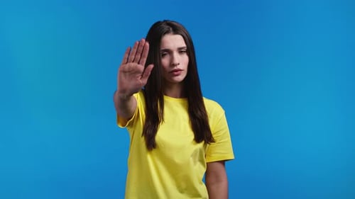 Pretty Woman Disapproving with No Palms Hands Sign Makes Basta Negation Enough Gesture