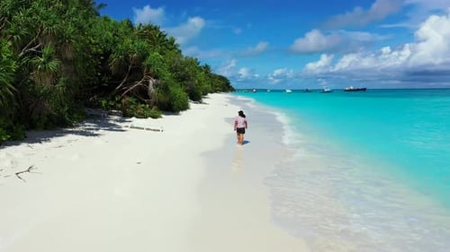 Lady alone sunbathes on idyllic island beach trip by turquoise ocean and white sand background of th