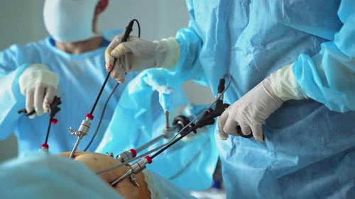 Surgeons Performing Minimally Invasive Laparoscopic Surgery