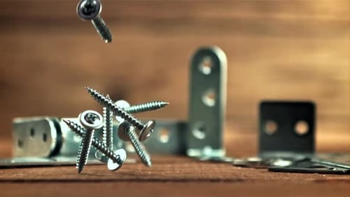 Screws and Fasteners Falling in Slow Motion