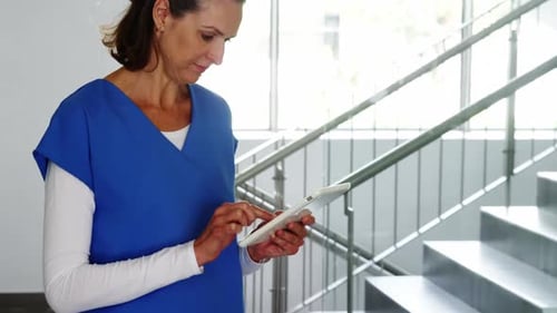 Nurse using digital tablet
