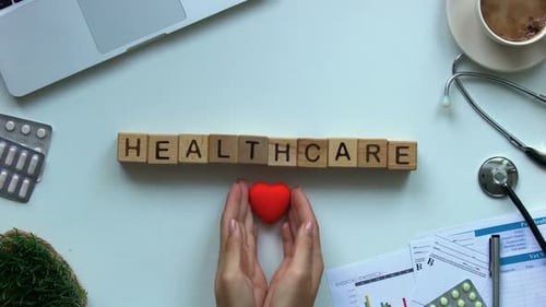 Red Heart Added to Healthcare Concept Flat Lay