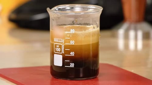 Beaker Filled With Dark Liquid
