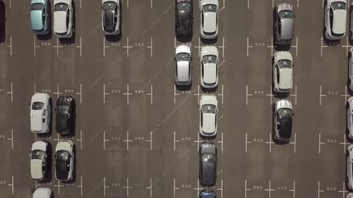 Aerial View of Parking Lot with Cars