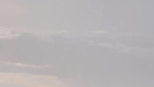 Majestic Clouds Billowing Across the Daytime Sky