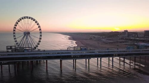 Pier With Ferris Wheel At Northern Sea Scheveningen Beach Near The Hague City Netherlands Aerial