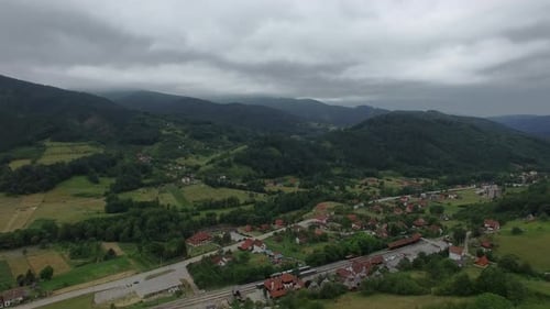 Flying Over a Valley with Country Houses