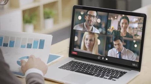 Back View of Businessman Video Conference with Colleagues From home.Business Remote Conference