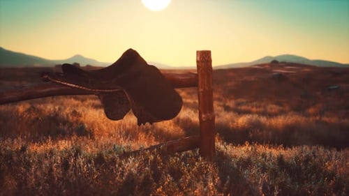 Old Saddle As the Sunset in the Country