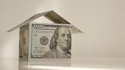 House Made of Money on White Background