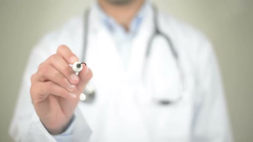 Doctor Writes Contact Us On Clear Surface