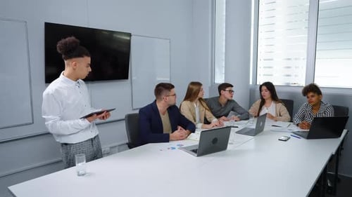 Business Team Meeting in Modern Office