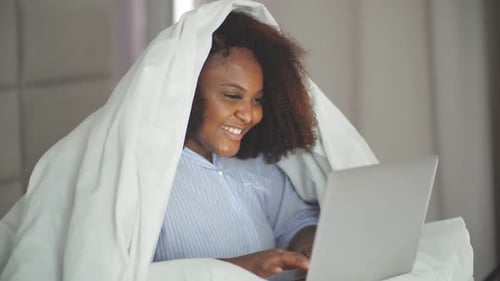 Happy Laughing Girl Using Laptop
