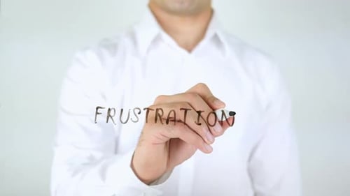 Writing "Frustration" on Clear Surface