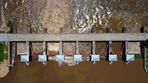 Aerial view of water released from the drainage channel of the concrete