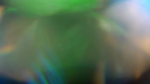 Abstract Lights in Blue Green and Orange. Bokeh Background